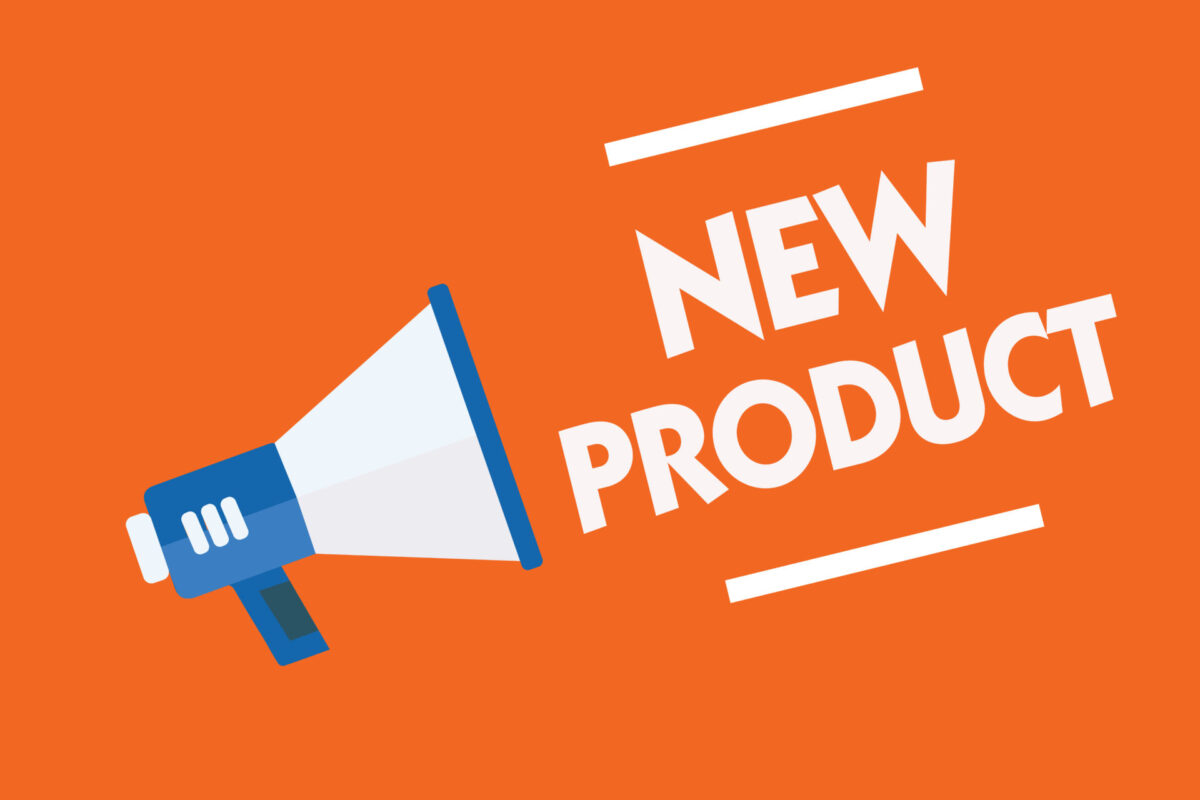 Megafon i napis New Product zapowiadający nowy aparat USG Alpinion